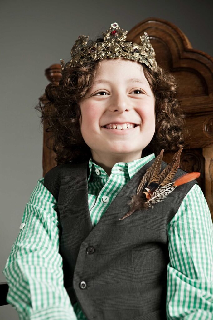young prince with a joyous smile wearing a crown a 2025 04 04 19 55 37 utc